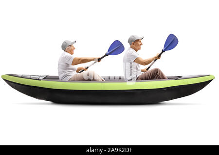 Senior man and woman in a kayak with paddles isolated on white background Stock Photo