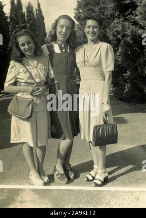 Three young women posing, Italy Stock Photo