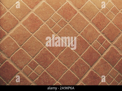 diamond-shaped terracotta tile floor Stock Photo