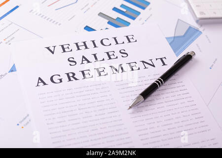 vehicle sales agreement concept, documents on the desktop Stock Photo