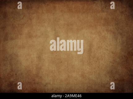 Old paper background with strong vignette Stock Photo