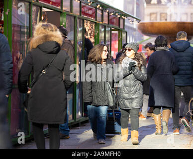 NEW YORK CITY - DECEMBER 7, 2018: Bryant Park in New York City Manhattan seen at Christmas time with Holiday shoppers and shopping boutiques. Stock Photo