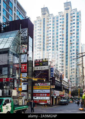 SEOUL, SOUTH KOREA - NOVEMBER 1, 2019: people near shops in Seocho District of Seoul city in autumn morning. Seoul Special City is the capital and lar Stock Photo