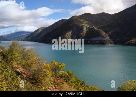 Zhinvali reservoirs with blue water on a background of mountains, Georgia Stock Photo