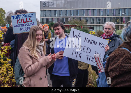 London, UK. 16th November 2019. Protesters from FCKBoris at Brunel University in Uxbridge  urge everyone to register and vote against Boris Johnson and kick him out for his racist, elitist politics.  Johnson had a majority of just over 5 thousand in 2017 and Labour candidate Ali Milani has strong hopes of beating him and the other 10 candidates. Peter Marshall/Alamy Live News Stock Photo