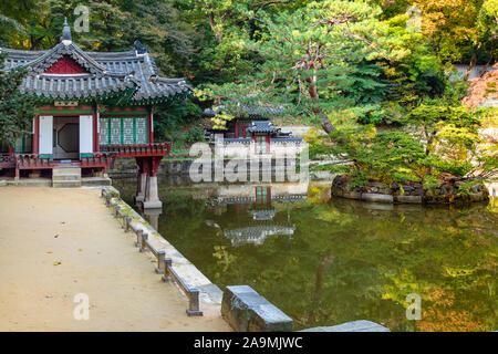 SEOUL, SOUTH KOREA - OCTOBER 31, 2019: wooden Buyongjeong Pavilion near Buyeongji pond in Huwon Secret Rear Garden of Changdeokgung Palace Complex in Stock Photo