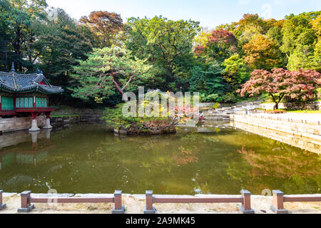 SEOUL, SOUTH KOREA - OCTOBER 31, 2019: view of Buyeongji pond with Buyongjeong Pavilion in Huwon Secret Rear Garden of Changdeokgung Palace Complex in