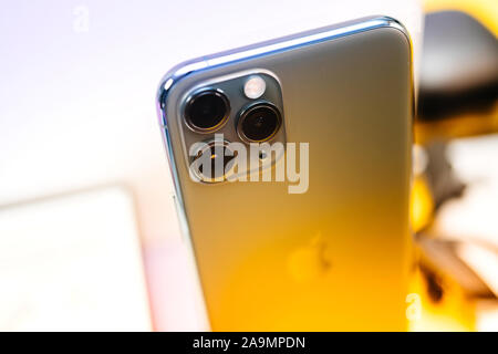 Paris, France - Sep 20, 2019: Detail of the triple-camera lenses of lates iPhone 11 Pro by Apple Computers Stock Photo