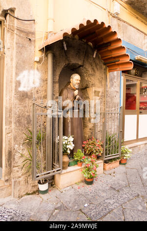 A shrine of Padre Pio in a street of Naples Stock Photo