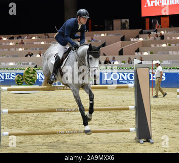 LOS ANGELES, CA. October 01, 2015: Raymond Texel (USA) riding Coupis in the Artemide Trophy International jumping competition at the 2015 Longins Masters Los Angeles at the L.A. Convention Centre. © 2015: Paul Smith / Featureflash Stock Photo