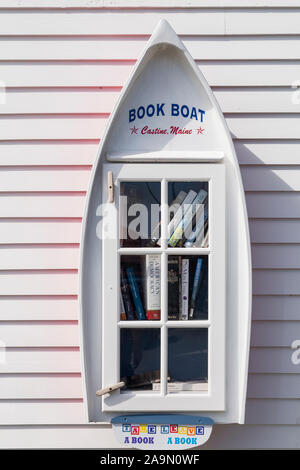 Little Free Libary book sharing in the shape of a boat, Castine, Maine, USA Stock Photo