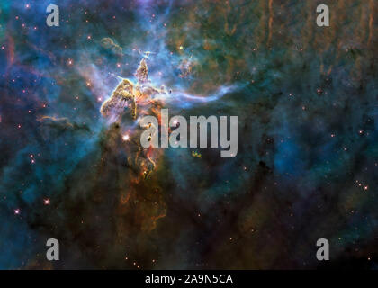 Deep space look. Mystic Mountain of Carina Nebula. Science fiction wallpaper. Elements of this image were furnished by NASA.