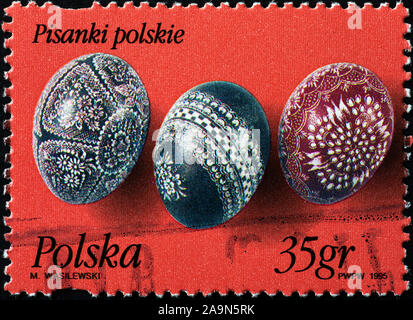 Three painted eggs for Easter on polish stamp Stock Photo
