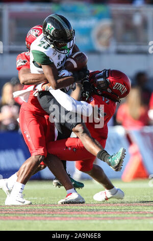 November 16, 2019: Hawaii Rainbow Warriors wide receiver Jared Smart (23) fumbles the football after being tackled by UNLV Rebels defensive back Evan Austrie (17) during the NCAA Football game featuring the Hawaii Rainbow Warriors and the UNLV Rebels at Sam Boyd Stadium in Las Vegas, NV. The game is tied at halftime 7 to 7. Christopher Trim/CSM Stock Photo