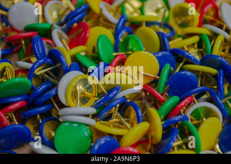 Close up of multicolored drawing pins or thumb tacks Stock Photo