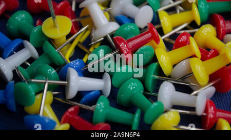 Close up of multicolored push pins or map pins Stock Photo
