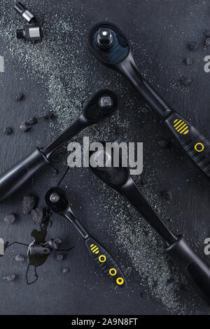 Professional ratchet tools placed on a black background, Wrench Tool for the work in the workshop. Stock Photo