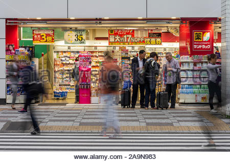 Shoppers And Pedestrians Move In And Past The Bic Camera Ikebukuro Main Store In Tokyo Japan Stock Photo Alamy