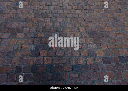 Colorful pavement made of blocks of stone in the streets of Toulouse, France Stock Photo