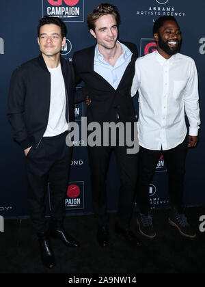 HOLLYWOOD, LOS ANGELES, CALIFORNIA, USA - NOVEMBER 16: Actors Rami Malek, Robert Pattinson and John David Washington arrive at the 13th Annual GO Campaign Gala 2019 held at NeueHouse Hollywood on November 16, 2019 in Hollywood, Los Angeles, California, United States. (Photo by Xavier Collin/Image Press Agency) Stock Photo