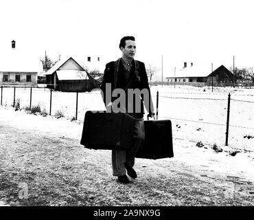 'Sweeney Steps Out.' Sweeney is the star of one of the many instructive and entertaining movie shorts the Linz, Upper Austria American House lends to volunteer operators who display them at rural schools and social centers. Stock Photo