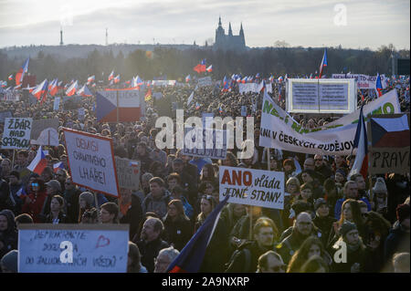 Prague, Czech Republic. 16th Nov, 2019. Crowd of protesters with flags, banners and placards during the demonstration.A day before the official celebrations of the 30th Anniversary of Velvet Revolution thousands protest demanding the resignation of Czech Republic's Prime Minister, Andrej Babis. The Million Moments for Democracy (organisers) set an ultimatum for the PM, Andrej Babis asking him to either remove his conflict of interest; get rid of the Agrofert firm and dismiss the Justice Minister, Marie Benesova or resign himself. Credit: SOPA Images Limited/Alamy Live News Stock Photo