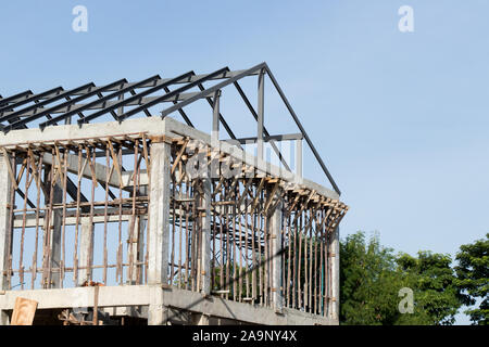Structure of house wait for complete builidng with blue sky background ...