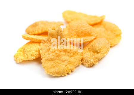 Cornflakes isolated macro. Small pile of corn flakes on white background Stock Photo