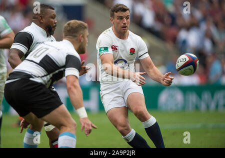 Twickenham, Surrey, United Kingdom. George FORD, releases the ball as Steffon ARMITAGE and Ian MADIGAN move to tackle,  during the, Old Mutual Wealth Cup, England vs Barbarian's match, played at the  RFU. Twickenham Stadium, on Sunday   28/05/2017England      [Mandatory Credit Peter SPURRIER/Intersport Images] Stock Photo