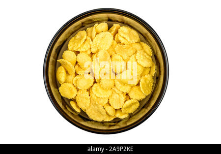 Cornflakes in bowl close up. Corn flakes  isolated on white background. Top view Stock Photo