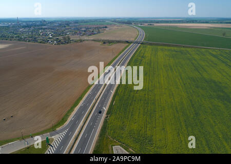 View of the M6 highway Minsk - Grodno on an April sunny day. Belarus