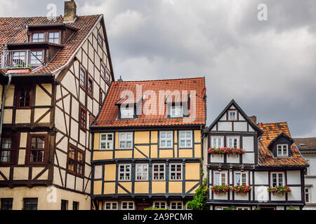View of colored facades of half -timbered houses in the old town of the medieval city of Quedlinburg, Harz, Germany. Traditional german architecture. Stock Photo