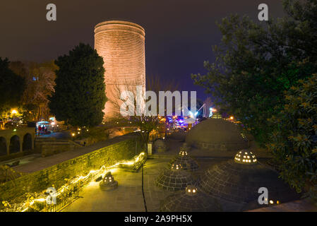 Maiden tower and hamam Haji Gaib in the night scenery of the Old City. Baku, Azerbaijan Stock Photo