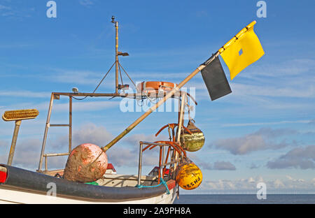 Various items of fishing equipment in the stern of an inshore fishing boat in North Norfolk at Cley-next-the-Sea, Norfolk, England, UK, Europe. Stock Photo