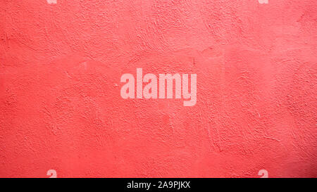 Pink stucco rustic wall texture background  . Pink cement background. architecture material exterior design . Mexican Mediterranean style. Stock Photo