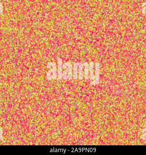 Red, yellow, pink glitter, sparkle confetti texture. Christmas seamless abstract background. Stock Photo
