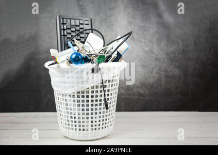 Electronics waste bin concept / Garbage electrical waste ready for recycling , Old devices E-waste disposal management reuse recycle and recovery Stock Photo