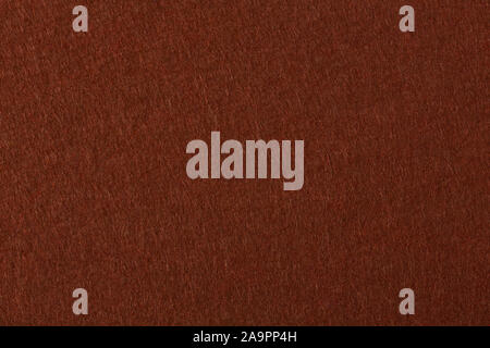 Background of dark brown felt. High quality texture in extremely high resolution. Stock Photo