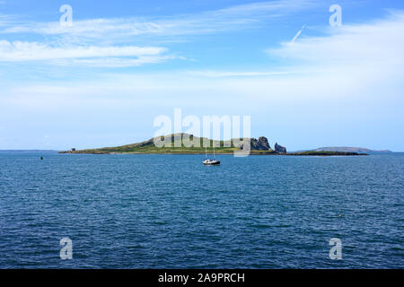 HOWTH, IRELAND -27 JUL 2019- View of the Ireland’s Eye, a small uninhabited island off the coast of County Dublin, Ireland, situated directly north of Stock Photo