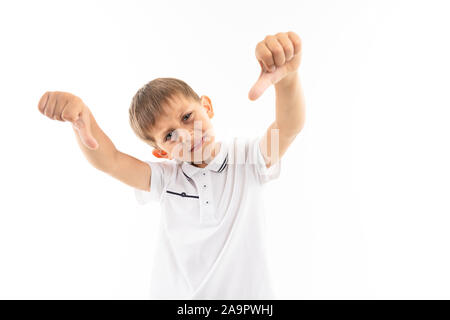 A little blonde boy shows very bad, picture isolated on white background Stock Photo