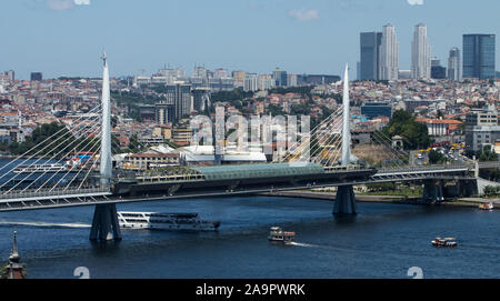 Golden Horn, Istanbul, Turkey July 18th, 2019: The latest bridge at the Golden Horn is a suspension bridge built for the subway. Stock Photo