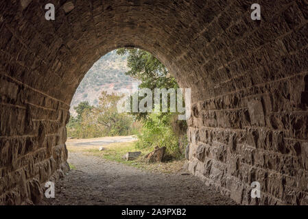 The eastern exit of the historic railroad tunnel at Waterval Boven in Mpumalanga Stock Photo