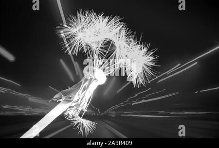 Resistance - a dandelion on street blurred lights background. Stock Photo