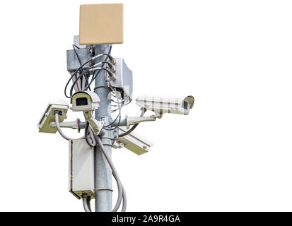Many CCTV camera  fixed on a pole, isolated on white background Stock Photo