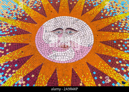 Sun face design in mosaic - Tours, France. Stock Photo