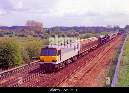 A class 92 electric locomotive number 92011 working a lengthy wagonload freight at Otford Junction on the 18th April 2002. Stock Photo