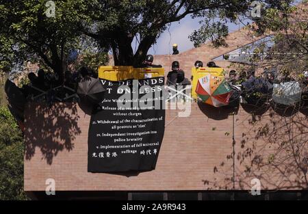 November 17, 2019, Hong Kong, CHINA: Students of the HONG KONG POLYTECHNIC UNIVERSITY display a banner from the verandah sending political message to the world.Nov-17,2019 Hong Kong.ZUMA/Liau Chung-ren (Credit Image: © Liau Chung-ren/ZUMA Wire) Stock Photo