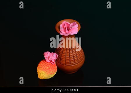 Many clay pot is on the table in pottery. Bright pottery. Stock Photo