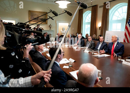 President Donald Trump speaks with reporters before boarding Marine One ...