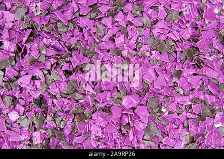 pieces of plastic for recycling. Crushed polyethylene, polypropylene close-up. The view from the top